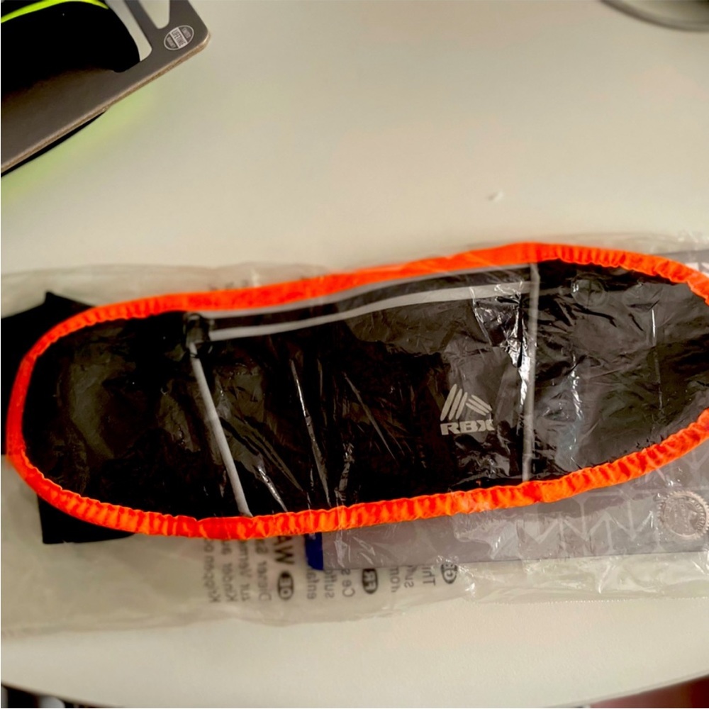 RBX- running &walking waist pack. Orange with Black.